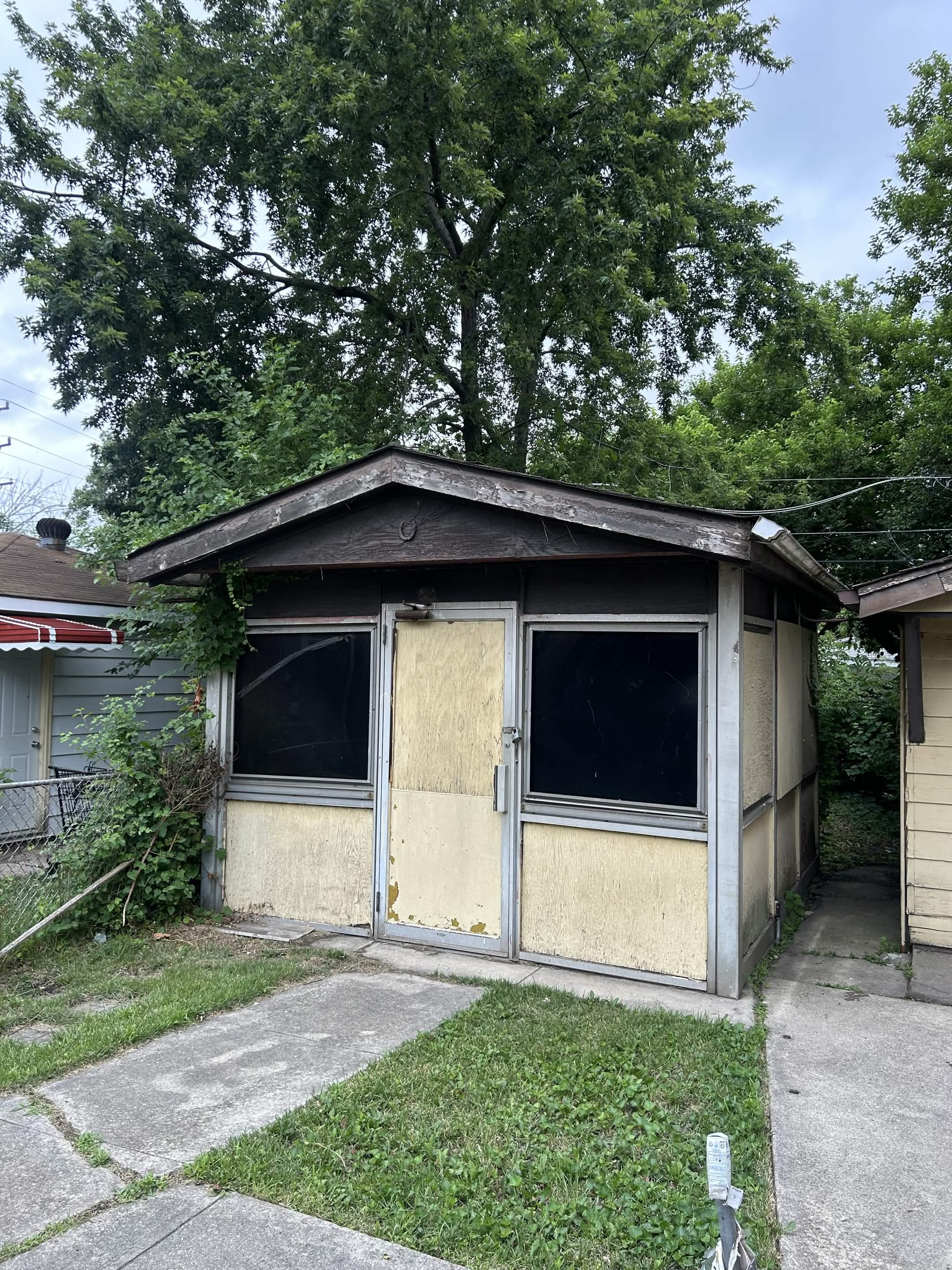 Old rundown shed structure before demolition